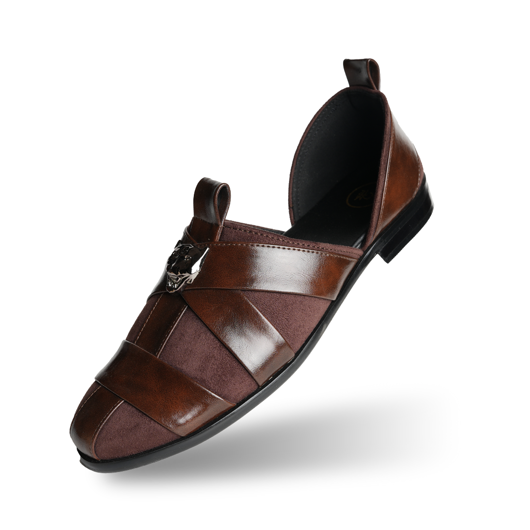 A pair of Monkstory Criss Cross Slip-On Sandals - Brown with elegant straps.