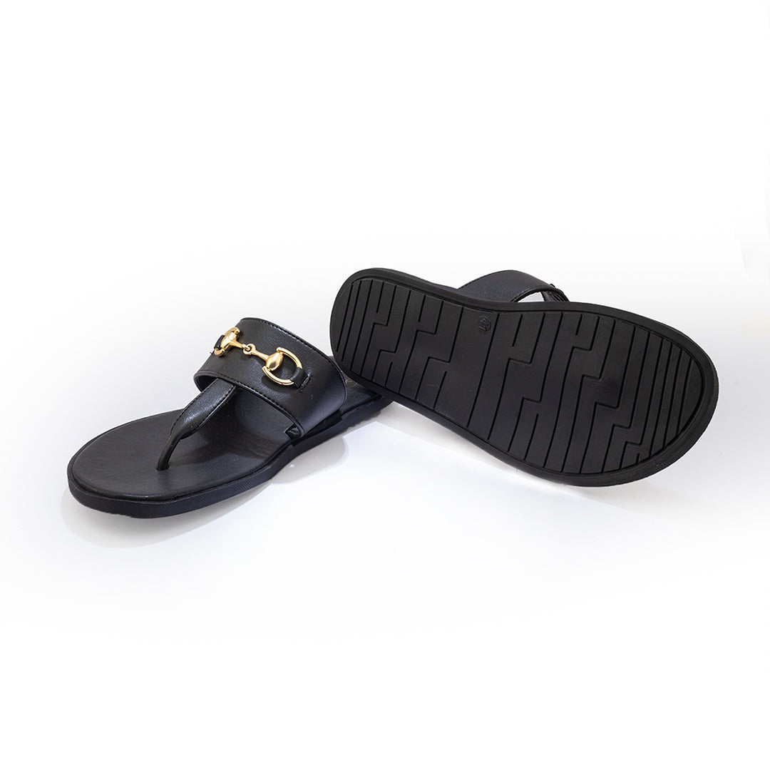 A pair of Monkstory T-Rad Horsebit Sandals in black leather with a gold buckle.