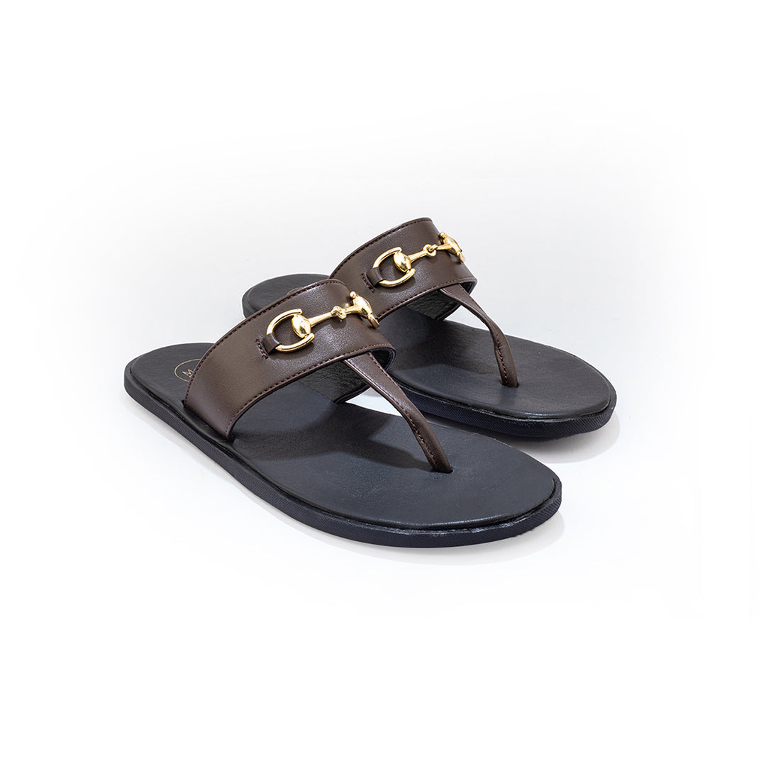 A pair of Monkstory T-Rad Horsebit sandals with gold buckles and grip-centric soles.