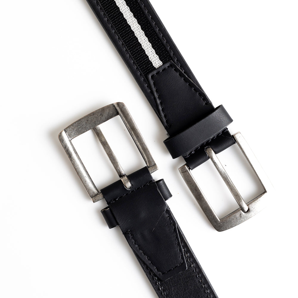 A MONKSTORY vegan belt with a silver buckle.