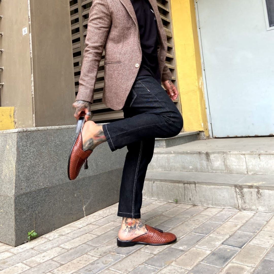 A monkstory men's high-class brown woven slipper with tassels and Luxious Mule Shoes Tan faux-fur insoles.