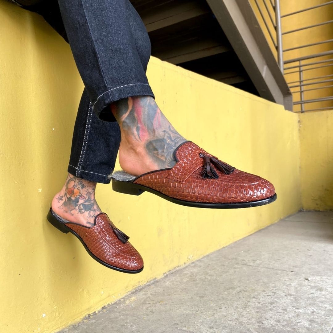 A monkstory men's high-class brown woven slipper with tassels and Luxious Mule Shoes Tan faux-fur insoles.