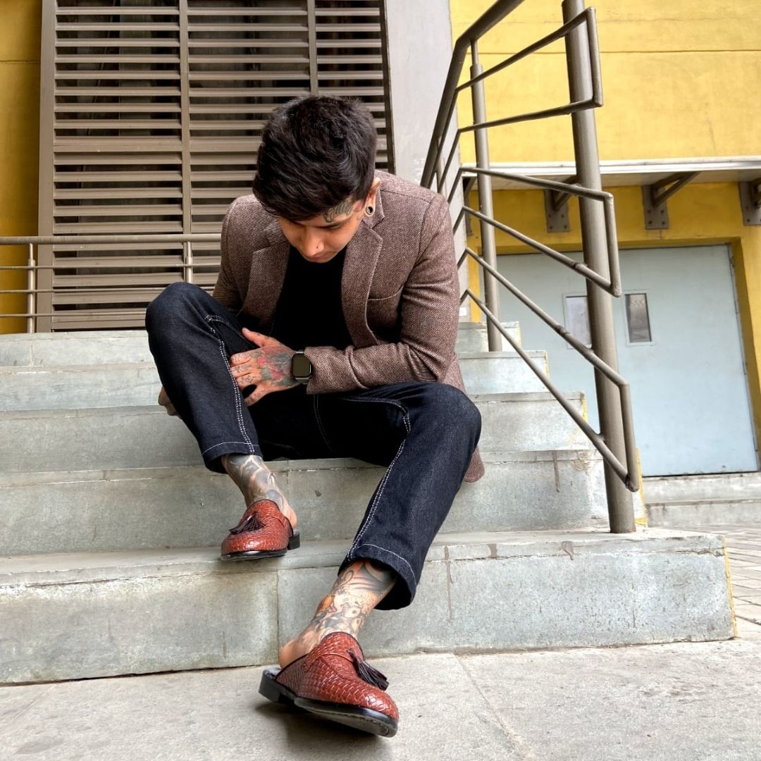 A monkstory men's high-class brown woven slipper with tassels and Luxious Mule Shoes Tan faux-fur insoles.