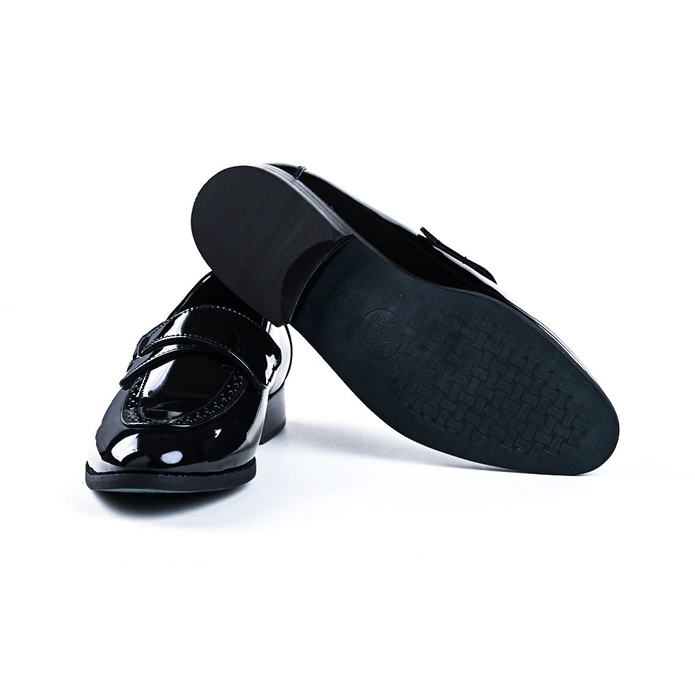 A pair of Drezzire Classic Patent Slip-Ons - Black from monkstory on a white background.