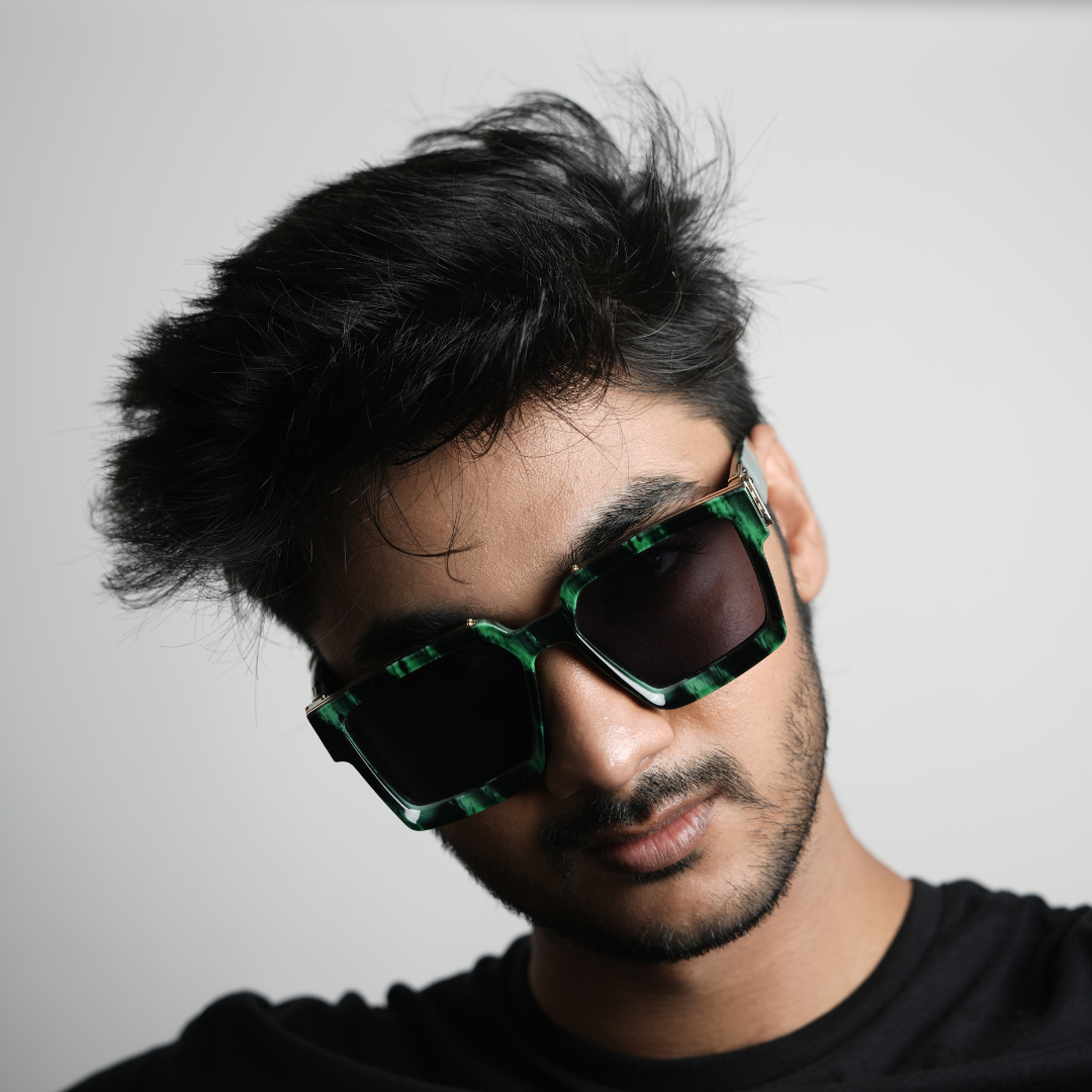 A green Monkstory Millionaire Unisex Wayfarer sunglasses with black lenses designed to protect against UV rays.