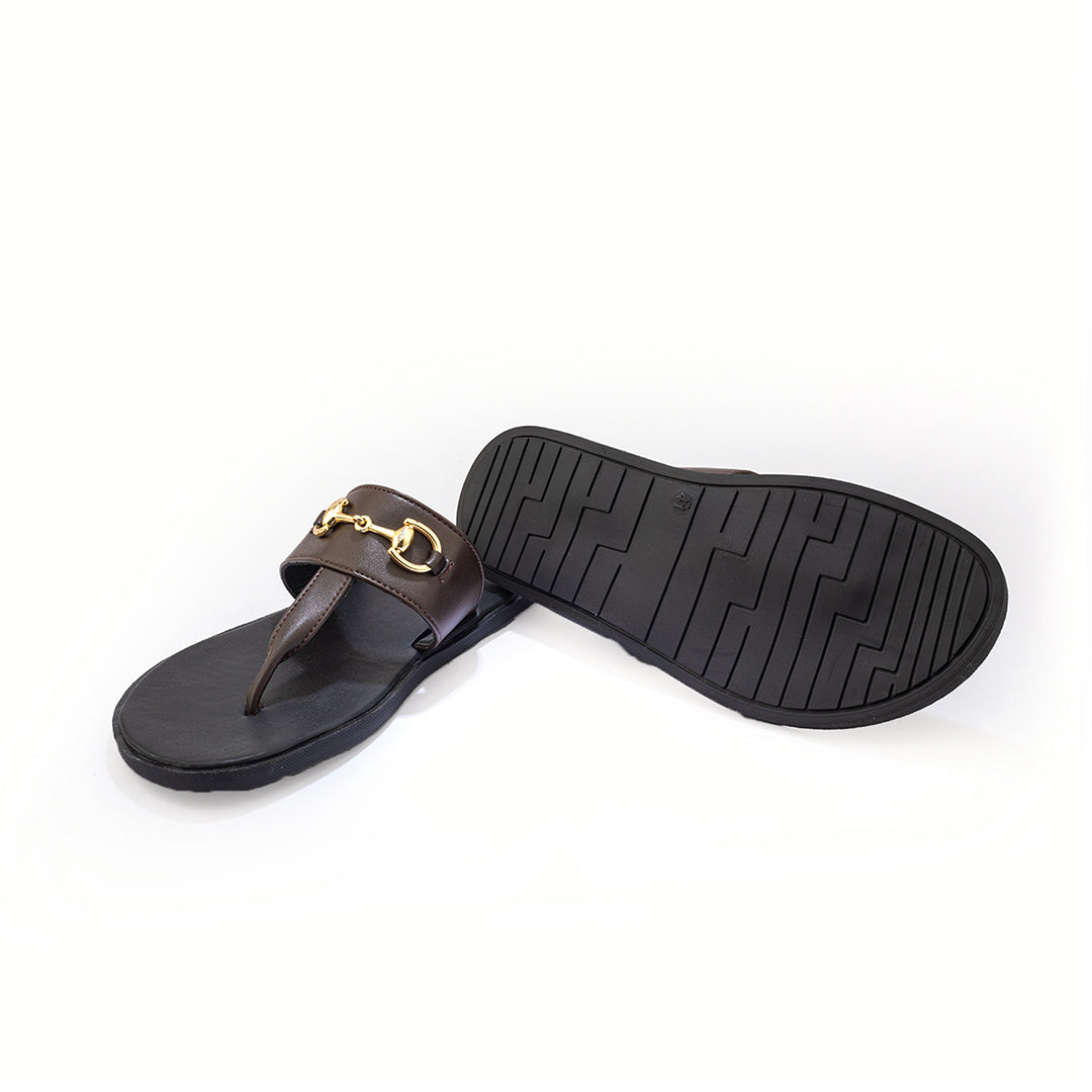 A pair of Monkstory T-Rad Horsebit sandals with gold buckles and grip-centric soles.