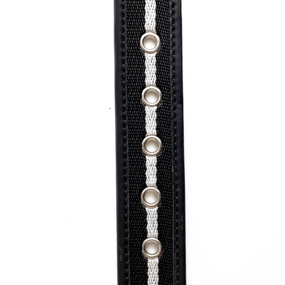A MONKSTORY vegan belt with a silver buckle.