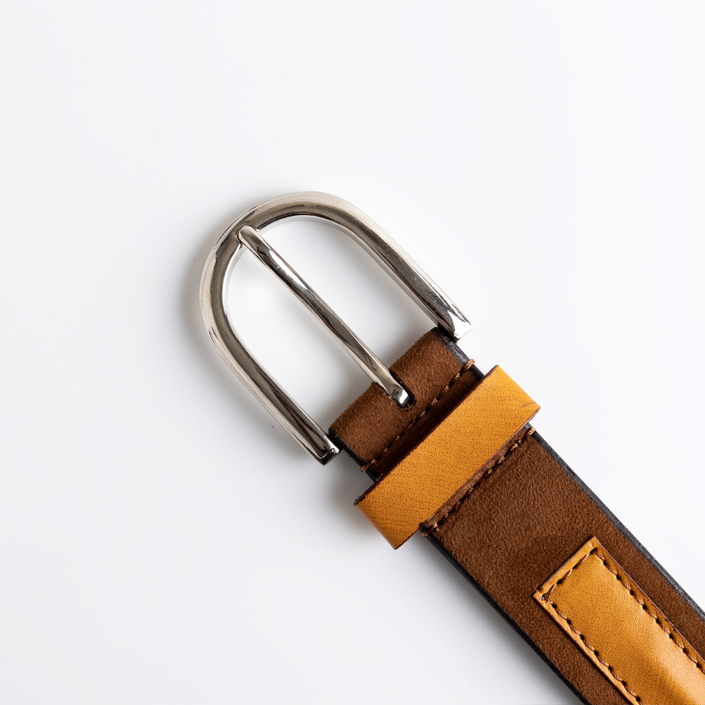 A MonkStory Dual Color Classic Mens Belt made from eco-friendly materials, featuring a combination of brown and tan leather, showcased on a white background.