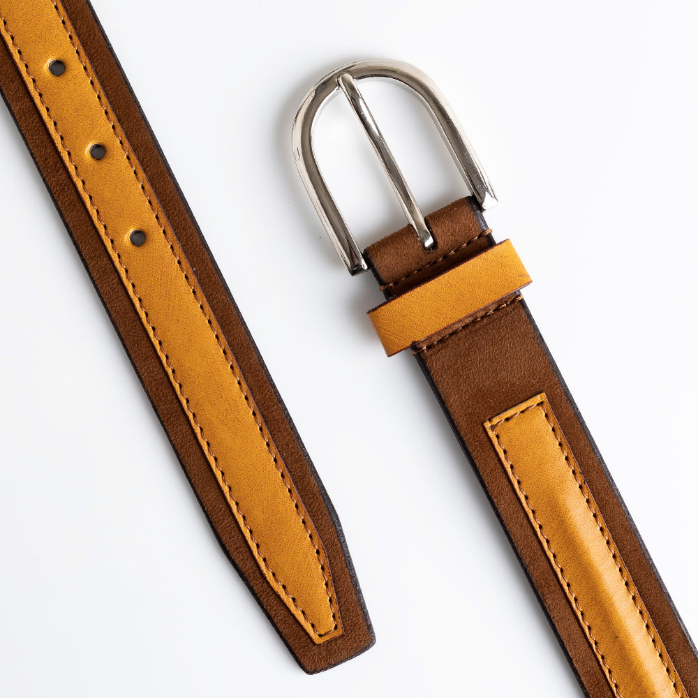 A MonkStory Dual Color Classic Mens Belt made from eco-friendly materials, featuring a combination of brown and tan leather, showcased on a white background.